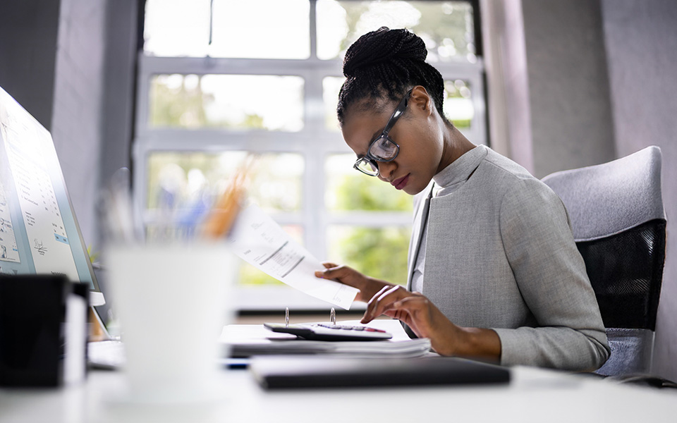 Female accountant working at desk