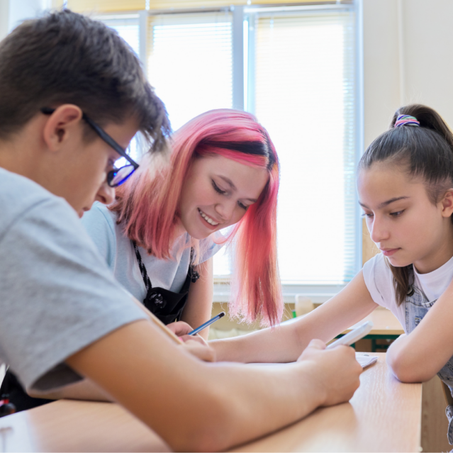 3 young people in classroom