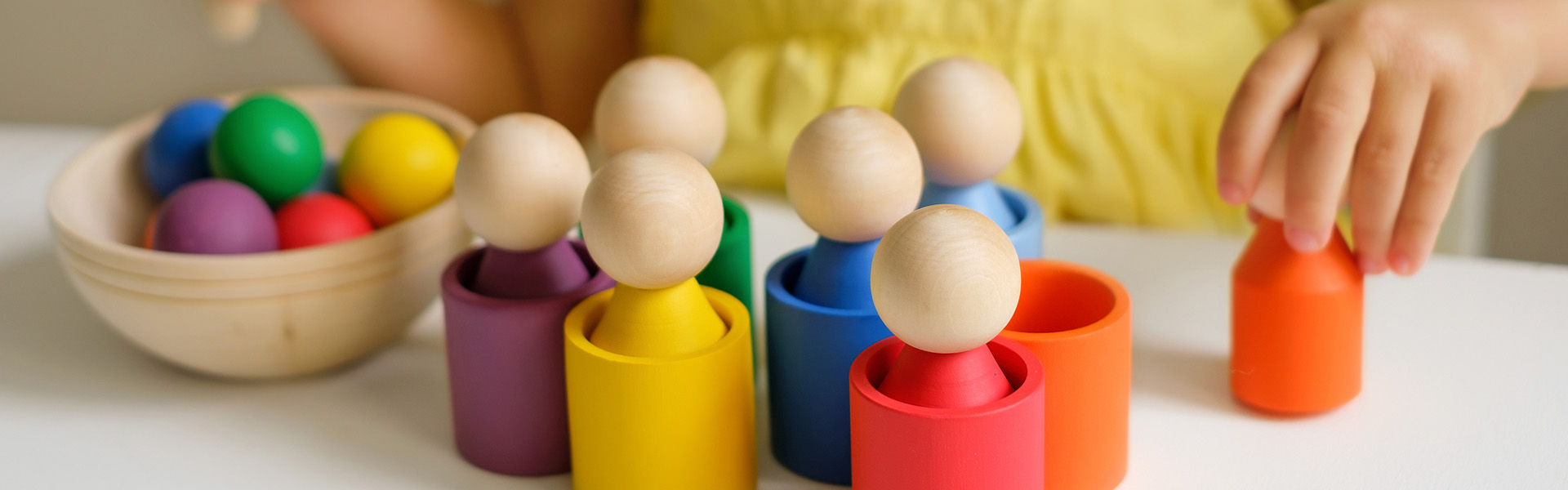 Child playing with building blocks