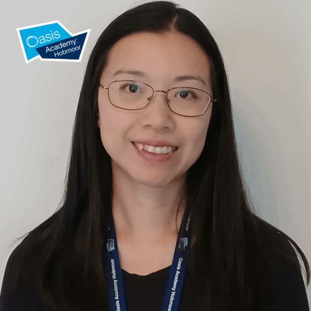 Amy smiling with the Oasis Academy logo above her