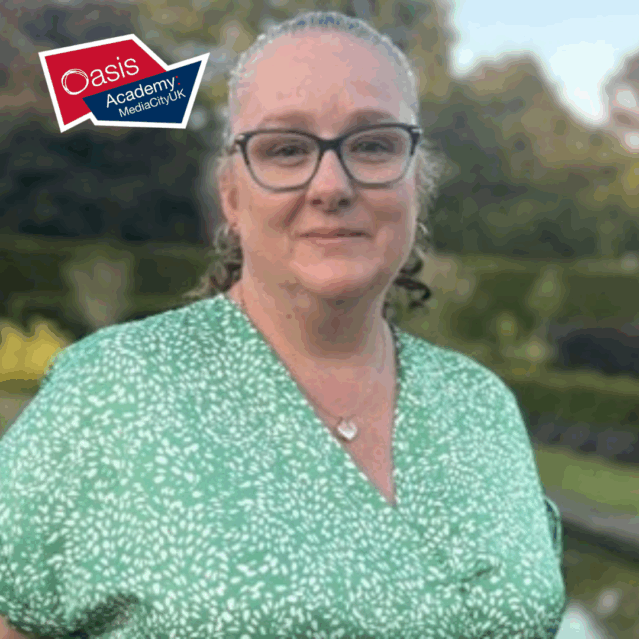 Nadine smiling in a garden with the Oasis Academy Media City logo above her
